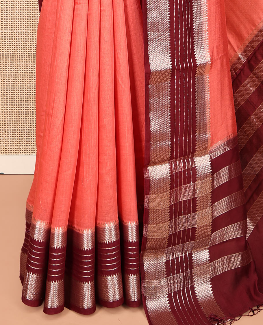 Peach Plain Assam Silk Saree, Complemented by a Contrast Traditional Zari Border, Zari-Striped Pallu, and a Contrast Blouse
