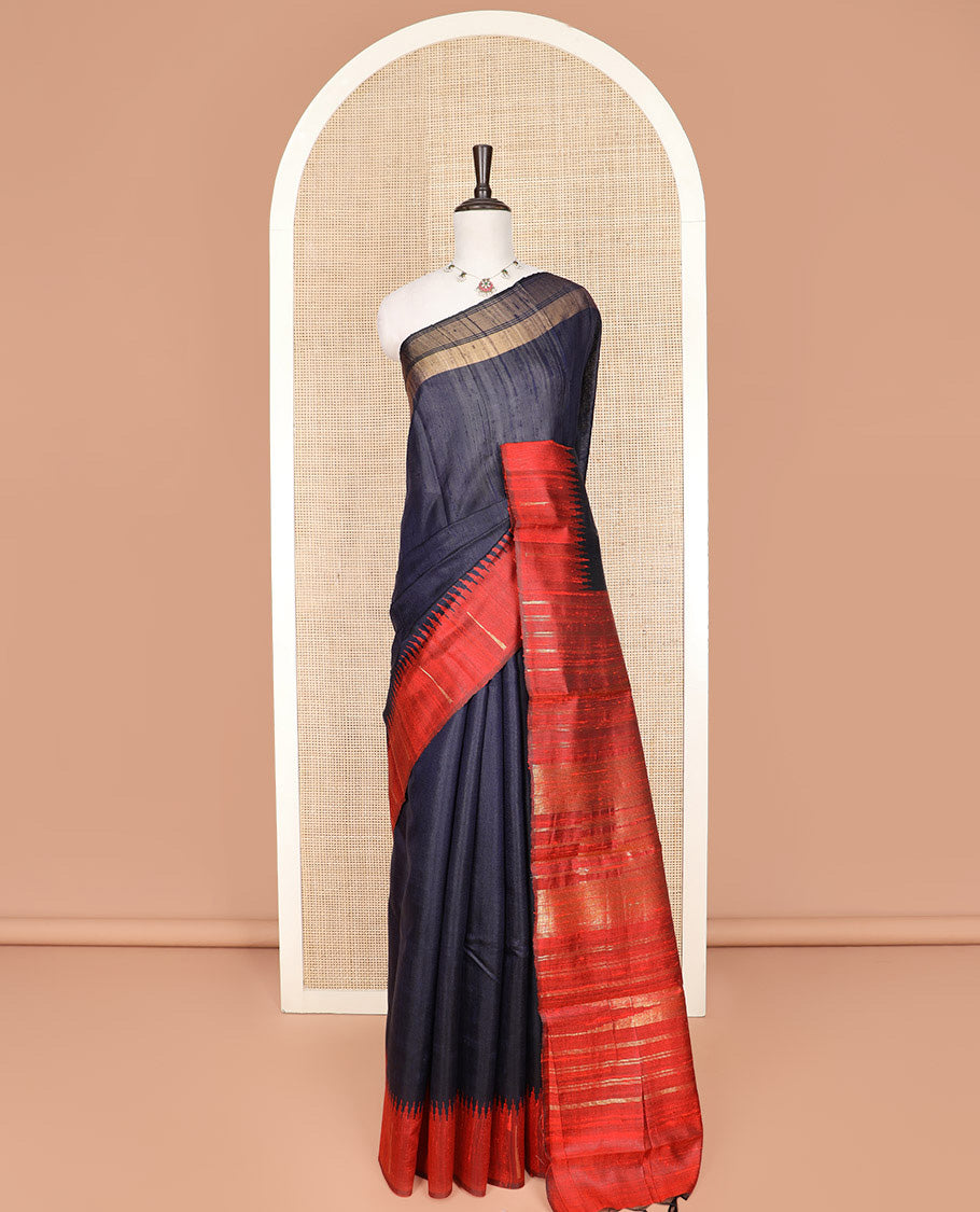 Navy Blue Plain Dupion Silk Saree, Complemented by a Contrast Temple Border, Gleaming Traditional Motifs Woven Pallu, and Paired with a Contrast Blouse