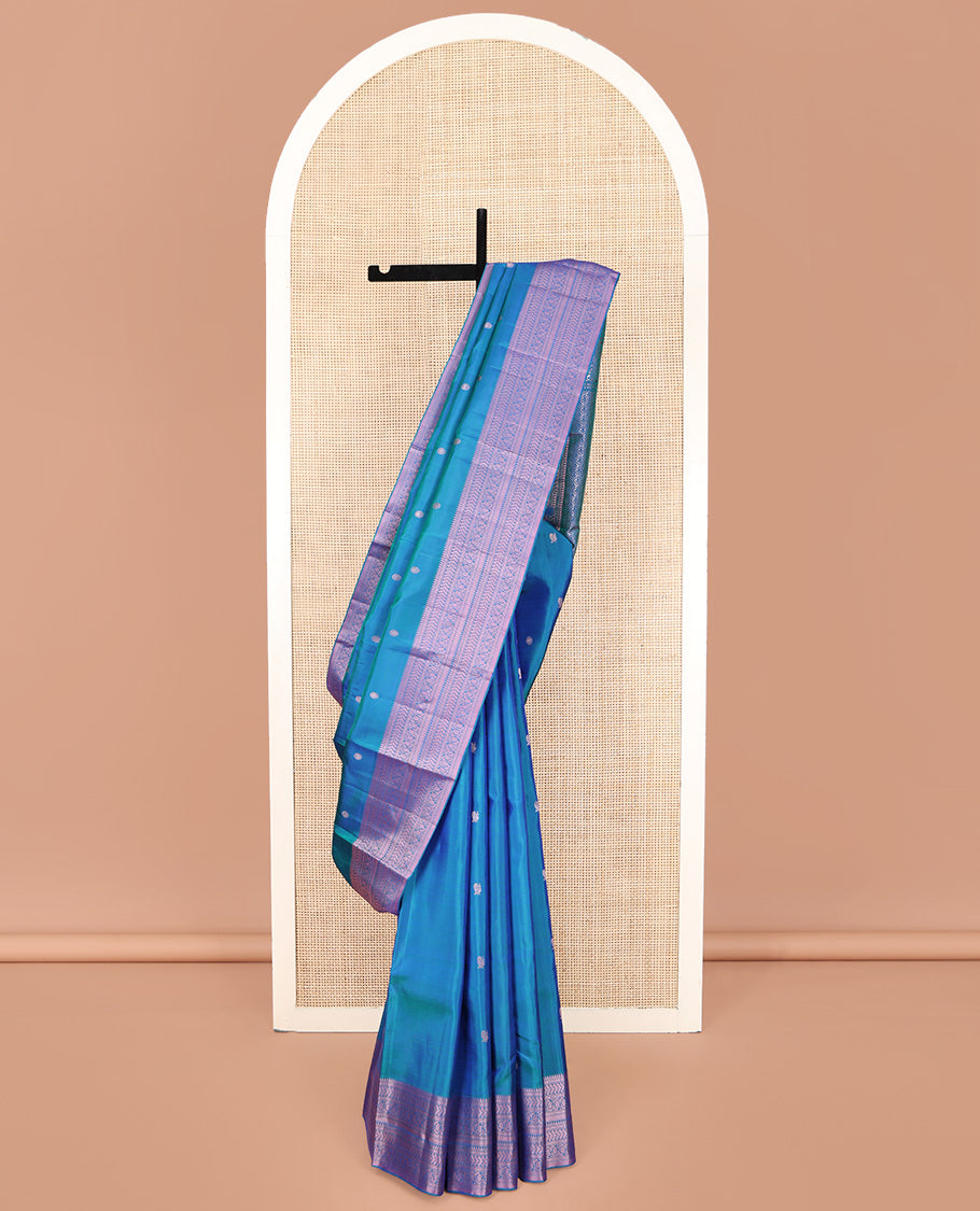 Blue Kanchipuram Silk Saree, Graced with Mayil and Chakram Thread Buttas on Its Body, Highlighted by a Self-Border of Rekku, Neli, Kathir, and Kodi Visiry Designs, Pallu of Jaal Designs, and Paired with a Matching Blouse