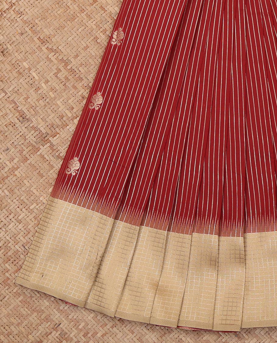 Maroon Litchi Saree, Gleamed Up with Zari Buttas and Stripes, a Contrast Zari Checked Border, Grand Pallu, and a Contrast Blouse