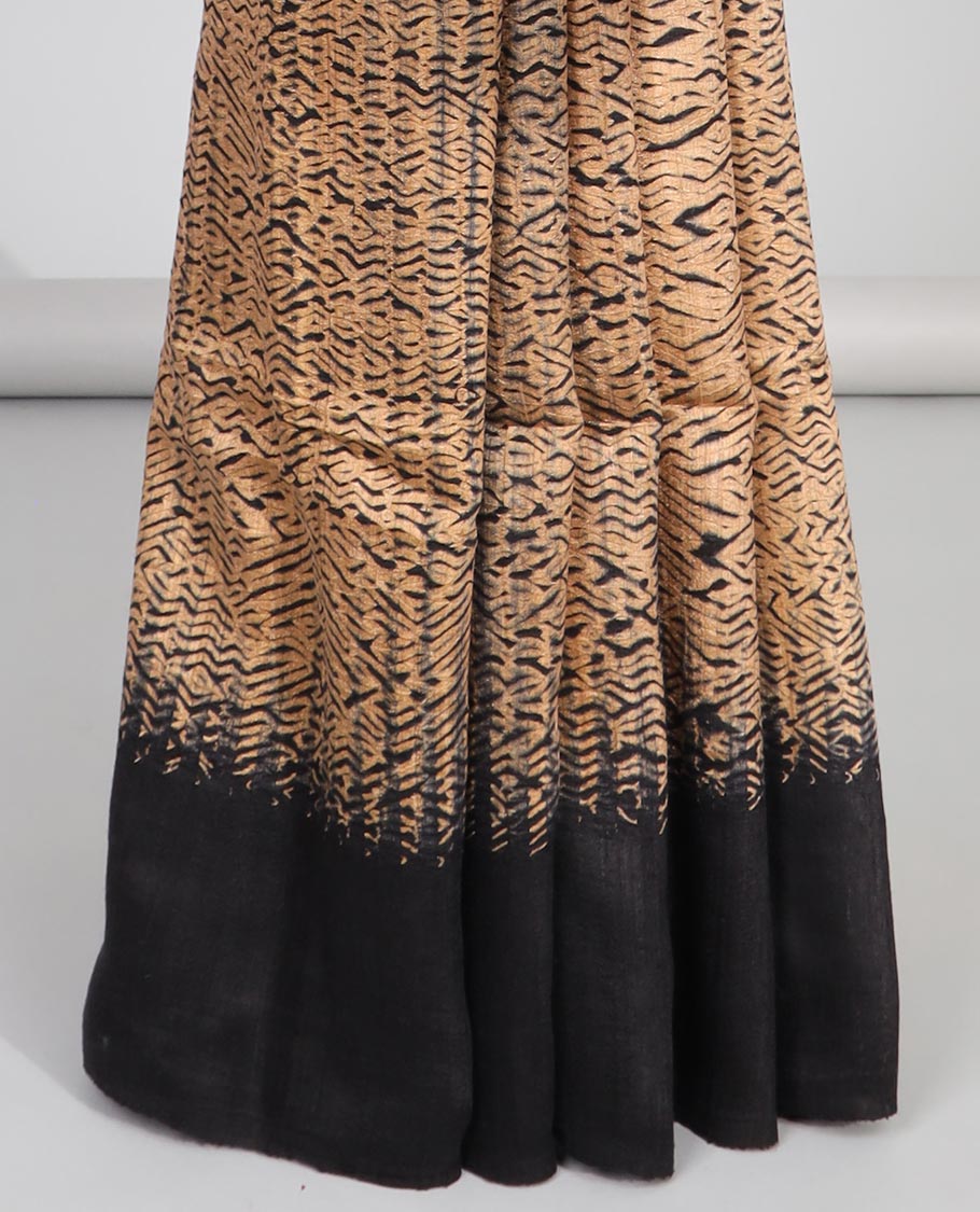 Light brown abstract design matka silk saree with contrast plain border & black abstract design pallu