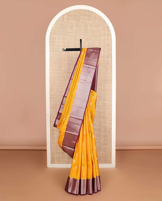 Yellow annam chakram buttas Vasundhara silk mix saree, contrast vanki & thilakam border & pallu of geometric designs