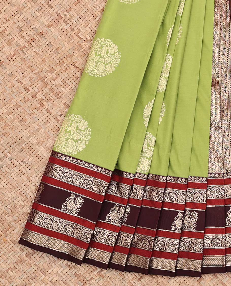 Green Budget Silk Saree, Embellished with Round Zari Buttas All Over Its Body, Complemented by Contrast Traditional Zari Designs Woven Border, Grand Jaal Pallu and Paired with a Contrast Blouse