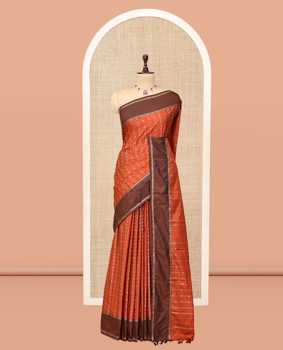Orange Arani Saree Features Zari Buttas, a Contrast Rettai Pettu Border, Pallu of Zari Designs, and a Matching Blouse