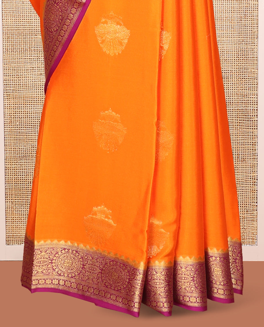 Orange Mysore Silk Saree, Bedecked with Zari Buttas All Over Its Body, Complemented by Captivating Contrast Border of Traditional Zari Designs, Gleaming Zari Striped Pallu, and Paired with a Contrast Blouse