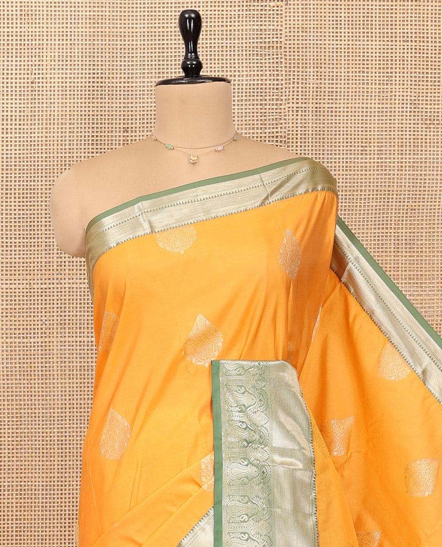 Yellow Budget Silk Saree, Subtly Sparkled with Zari Buttas, Complemented by a Contrast Traditional Zari Border, Grand Jaal Pallu, and Contrast Blouse