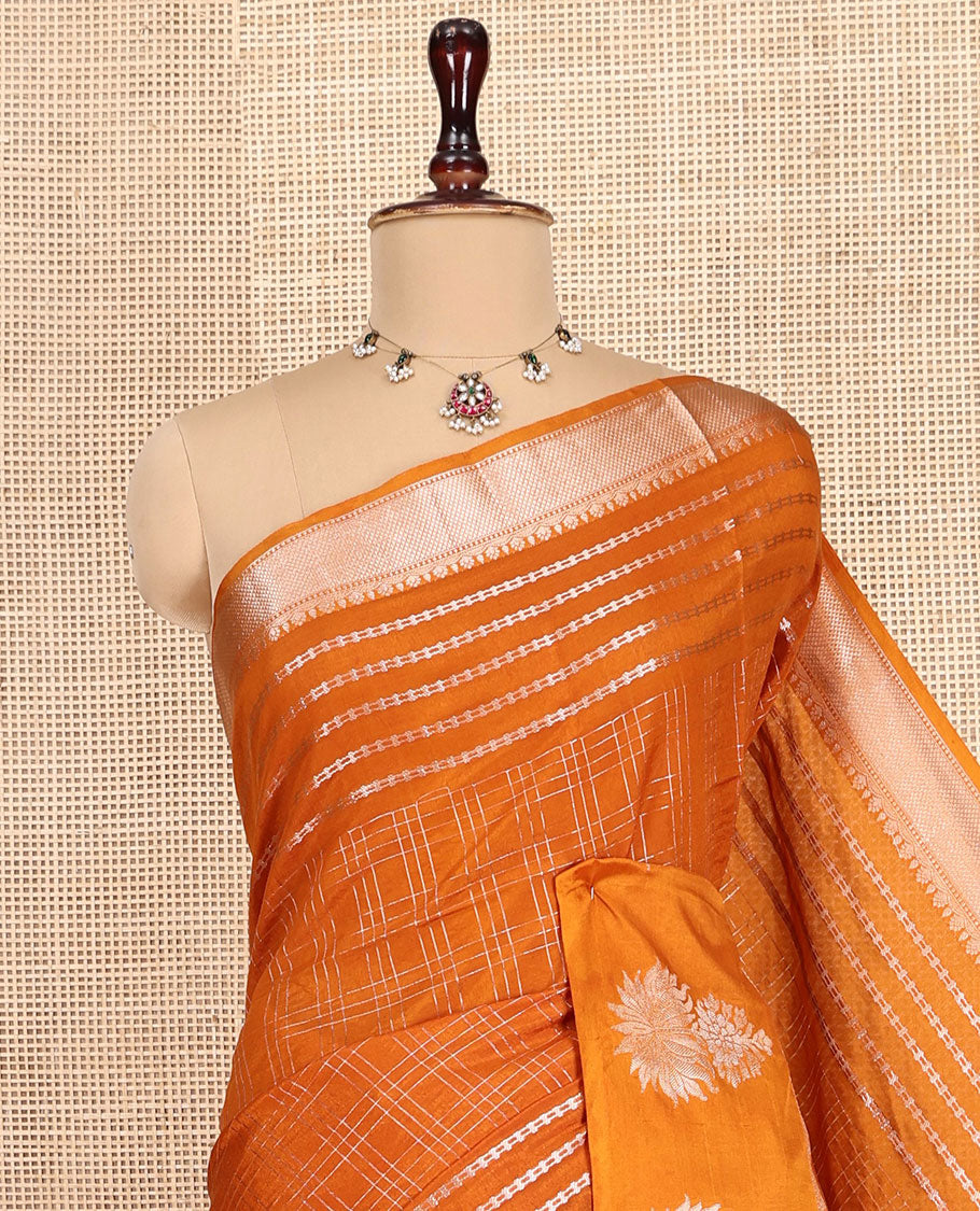 Orange Assam Silk Saree, Bedecked with Zari Checks, Highlighted by a Traditional Zari Border, Floral Butta Enclosed Checks Pallu, and a Matching Blouse