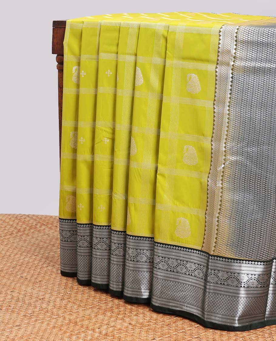 Green paisely enclosed checked design gift saree with contrast intricate zari design border & checked zari design pallu
