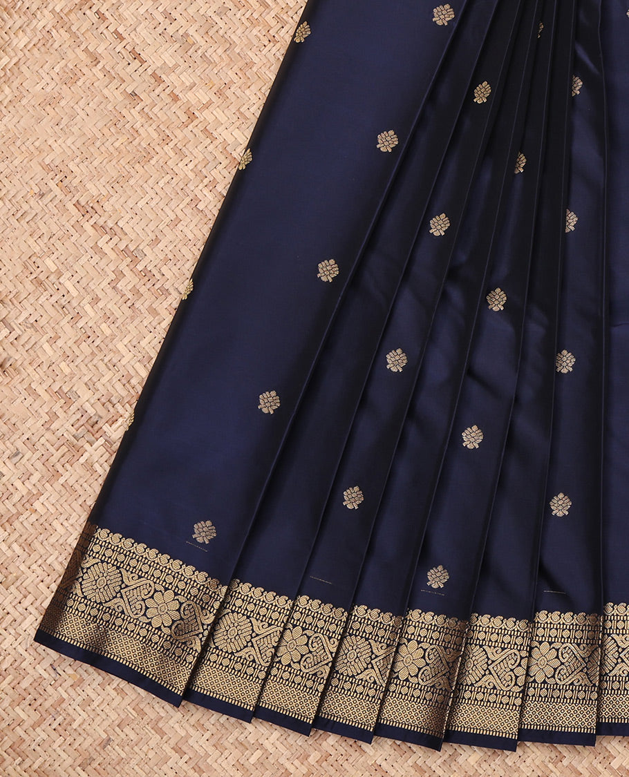 Navy Blue Budget Silk Saree, Embellished with Zari Buttas, Highlighted by a Traditional Zari Border, Intricate Pallu, and Matching Blouse