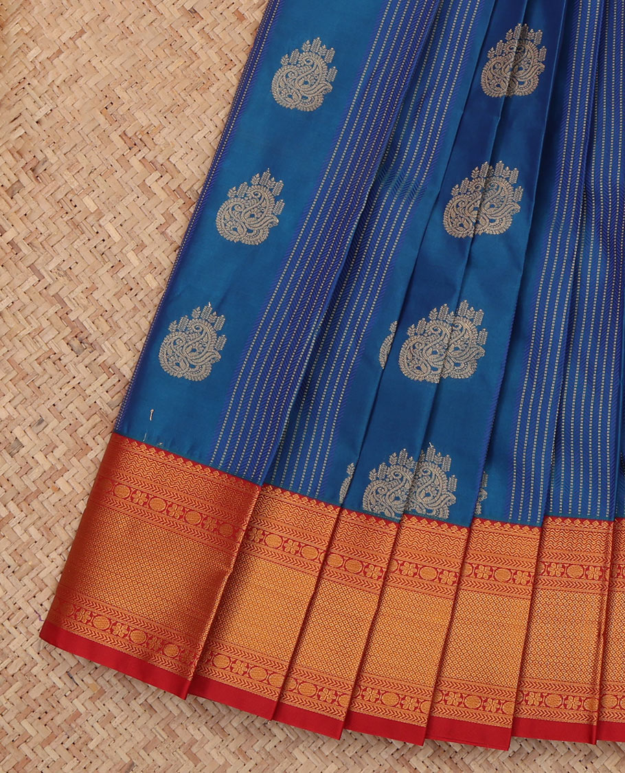 Blue Budget Silk Saree, Accentuated with Zari Buttas and Stripes, a Contrast Traditional Zari Border, Jaal Pallu, and a Contrast Blouse