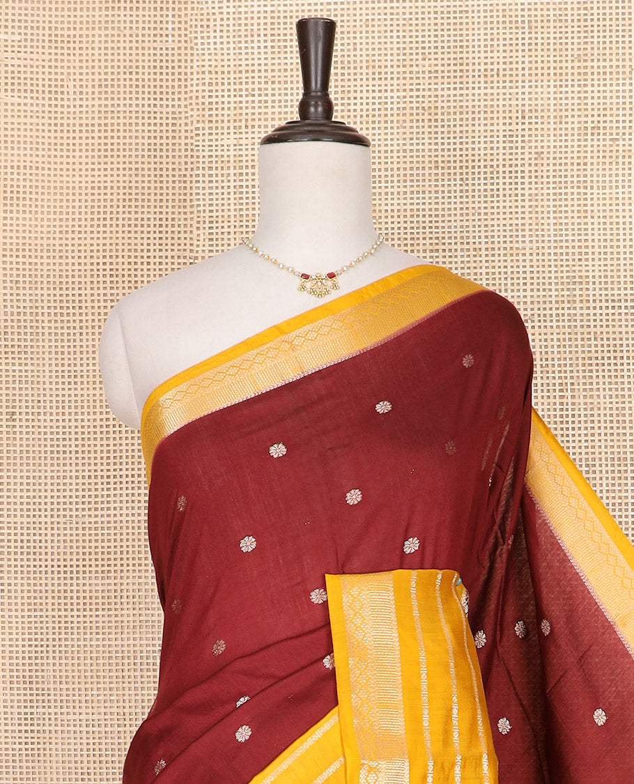 Maroon floral buttas Assam silk saree, contrast traditional zari border, and pallu of zari stripes