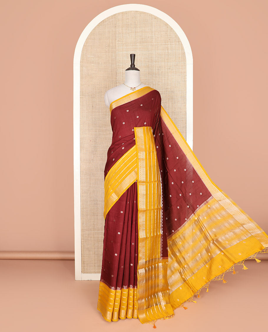 Maroon floral buttas Assam silk saree, contrast traditional zari border, and pallu of zari stripes