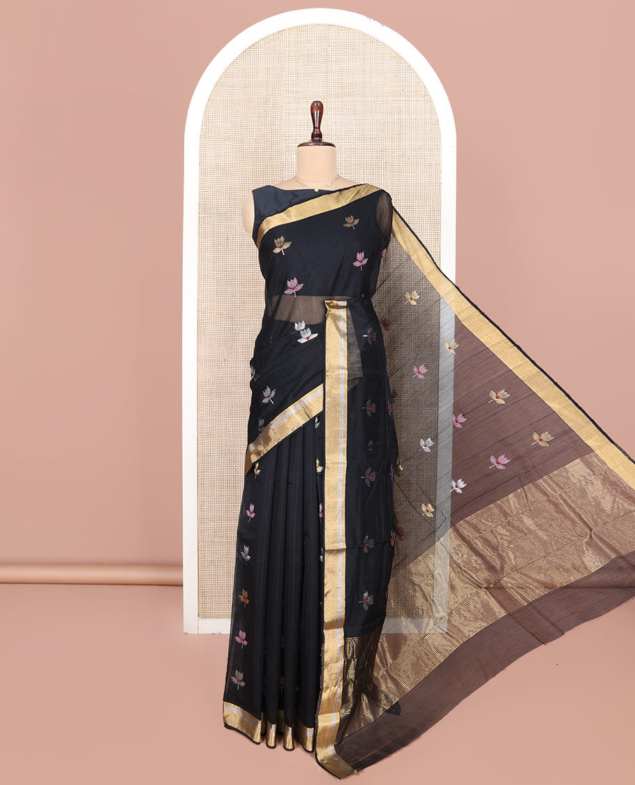 Black Chanderi Cotton Saree, Embellished with Floral Buttas All Over Its Body, Highlighted by Zari Border, Pallu Steeped with Zari Stripes, and Paired with a Matching Blouse