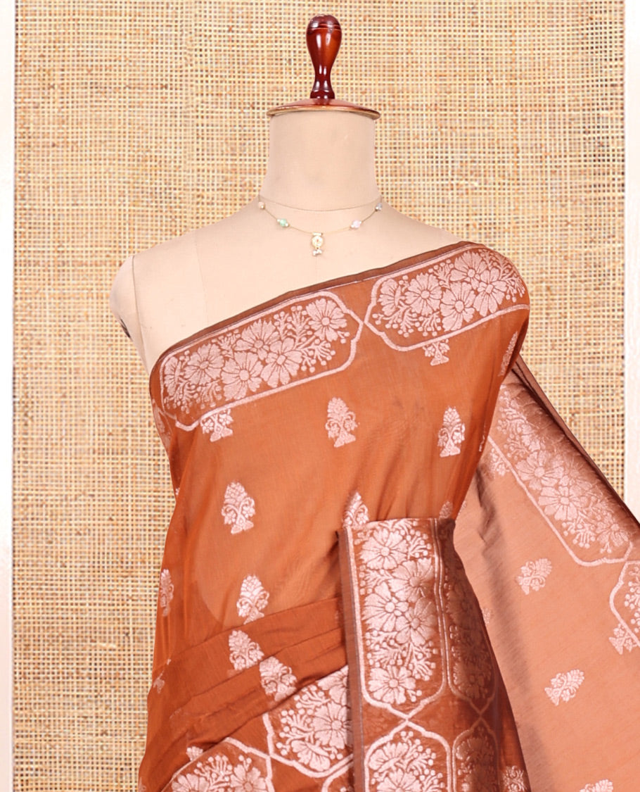 Rust Orange Semi-Silk Cotton Saree, Gleamed Up with Zari Buttas All Over Its Body, a Subtle Border of Floral Designs, Grand Jaal Pallu, and Paired with a Matching Blouse