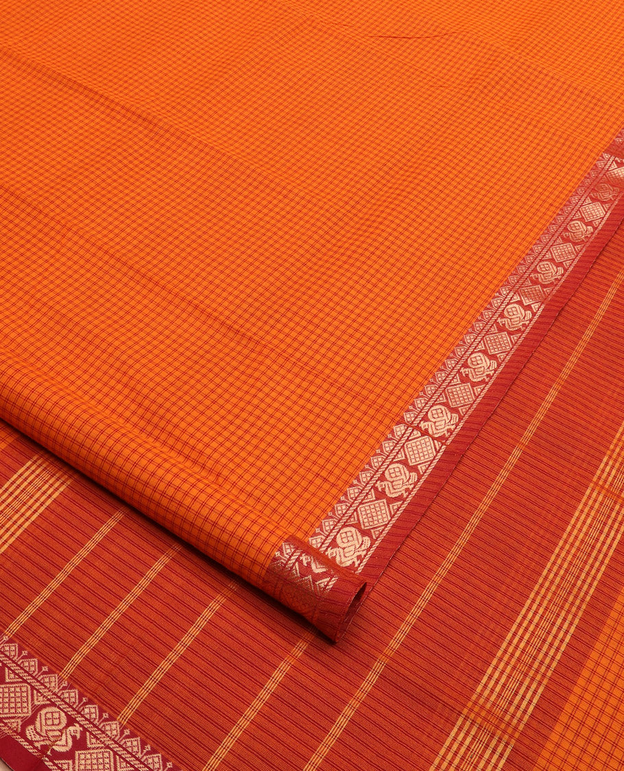 Orange micro-checked nine-yard cotton saree, contrast traditional design border, and striped pallu