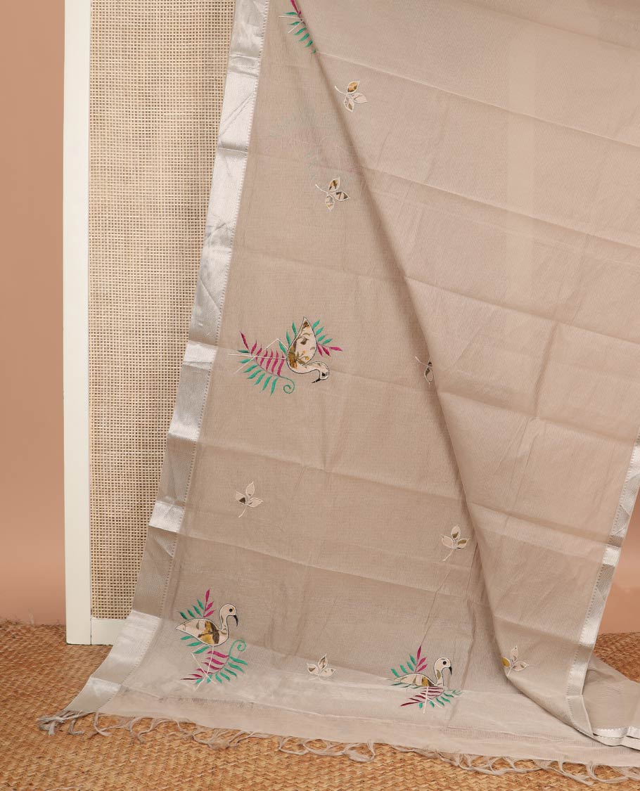 Beige sparsely striped with flamingo patch and thread embroidered chirala cotton saree, temple zari border and pallu of flamingo patch and thread embroidery