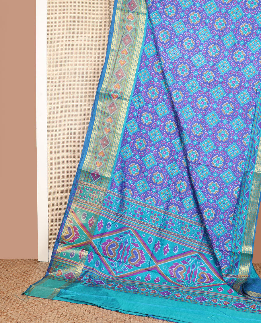 Blue ikkat design semi-banaras patola silk saree, traditional zari border of ikkat design, and ikkat design pallu