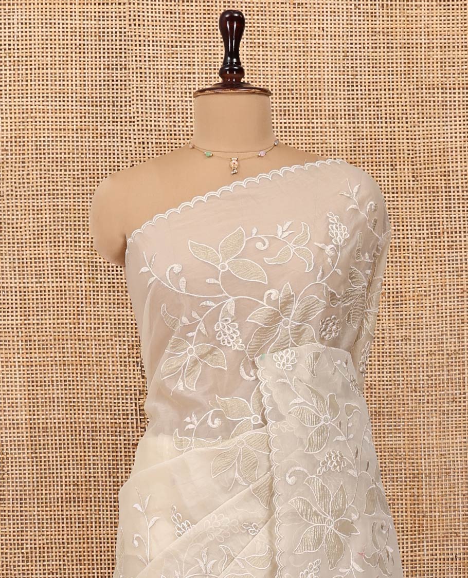 Beige Organza Saree, Finely Crafted with Floral Jaal Applique Embroidery All Over Its Body, Scallop Lace Border, Floral Embroidered Pallu, and Paired With a Embroidered Blouse