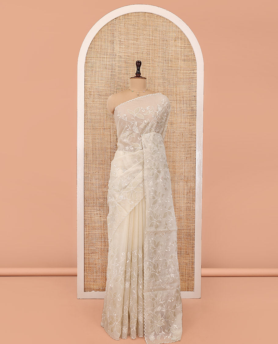Beige Organza Saree, Finely Crafted with Floral Jaal Applique Embroidery All Over Its Body, Scallop Lace Border, Floral Embroidered Pallu, and Paired With a Embroidered Blouse