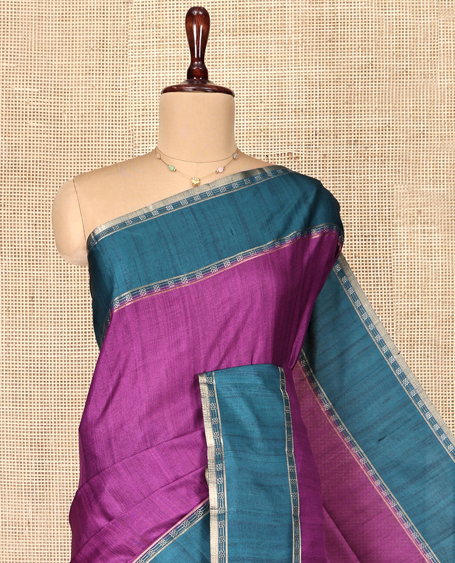 Purple Plain Semi-Tussar Silk Saree, Complemented by a Contrast Geometric Design Border, Subtly Zari Striped Pallu, and Paired with a Contrast Patola Printed Blouse