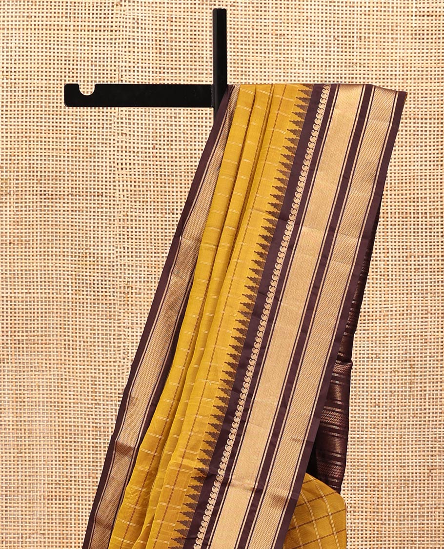 Mehendi Green and Brown Vasundhara Lite Silk Mix Saree, Graced with Checked Design All Over Its Body, Complemented by a Contrast Thazampoo Rekku Border of Manga Mokku, Muthu, and Mayil Kann Designs, Grand Pallu, and Paired with a Contrast Blouse