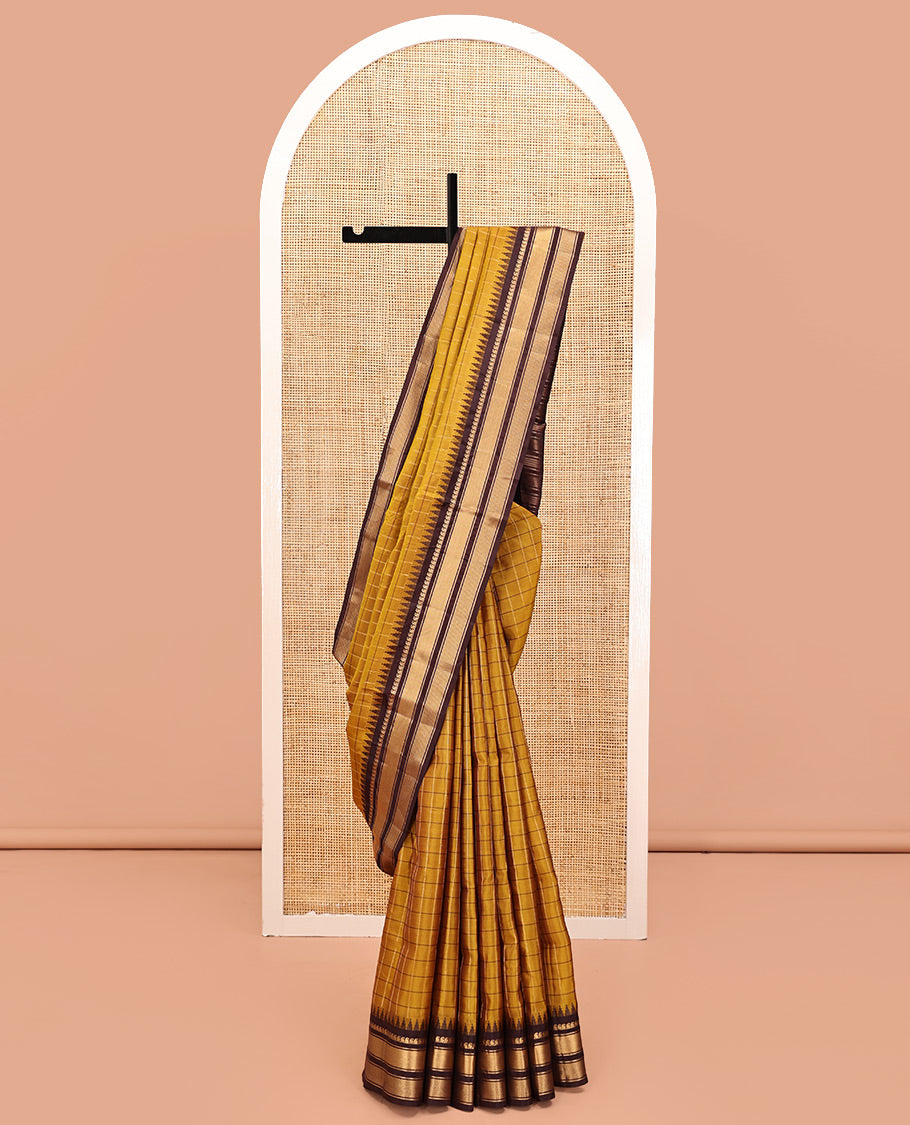 Mehendi Green and Brown Vasundhara Lite Silk Mix Saree, Graced with Checked Design All Over Its Body, Complemented by a Contrast Thazampoo Rekku Border of Manga Mokku, Muthu, and Mayil Kann Designs, Grand Pallu, and Paired with a Contrast Blouse