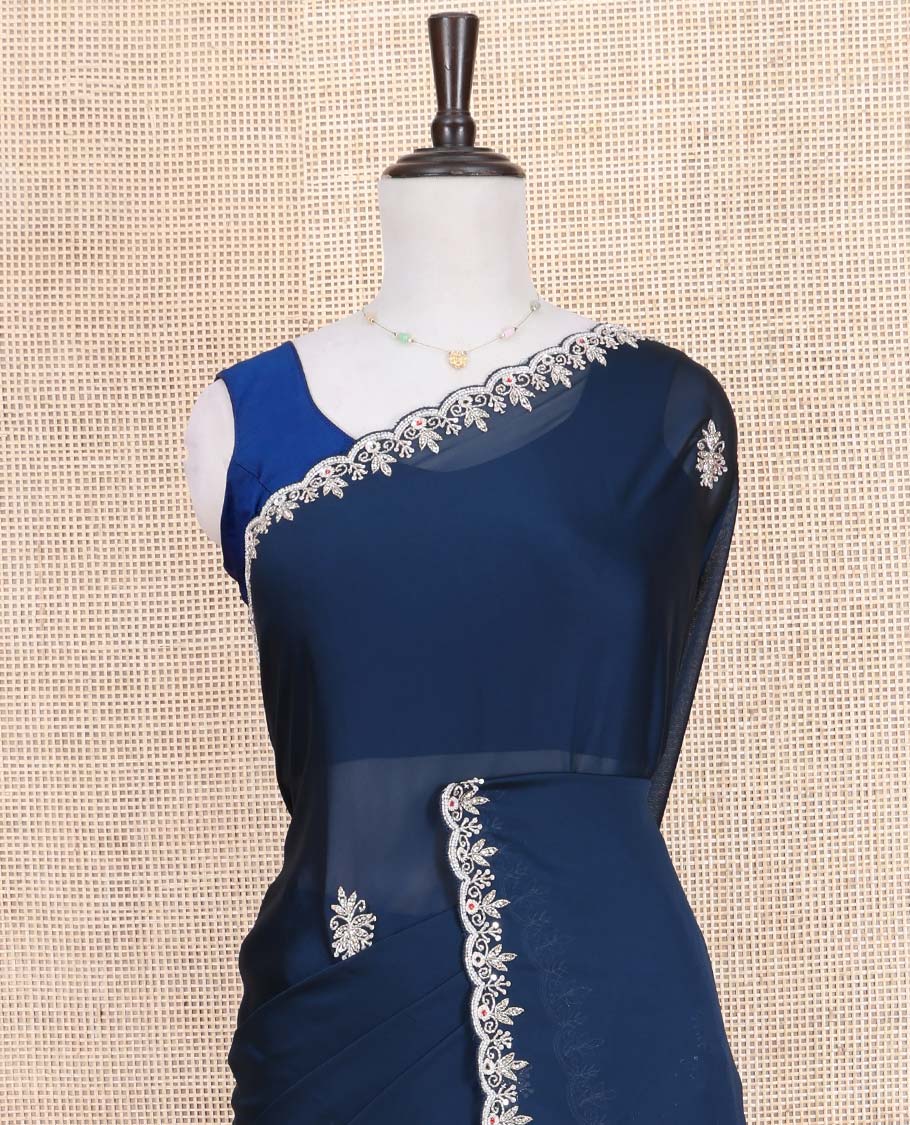 Blue Designer Saree, Mesmerized with Stone Embroidered Buttas on Its Body, Highlighted by Scallop Stone Work Border, Self-Pallu, and Paired with a Matching Embroidered Blouse