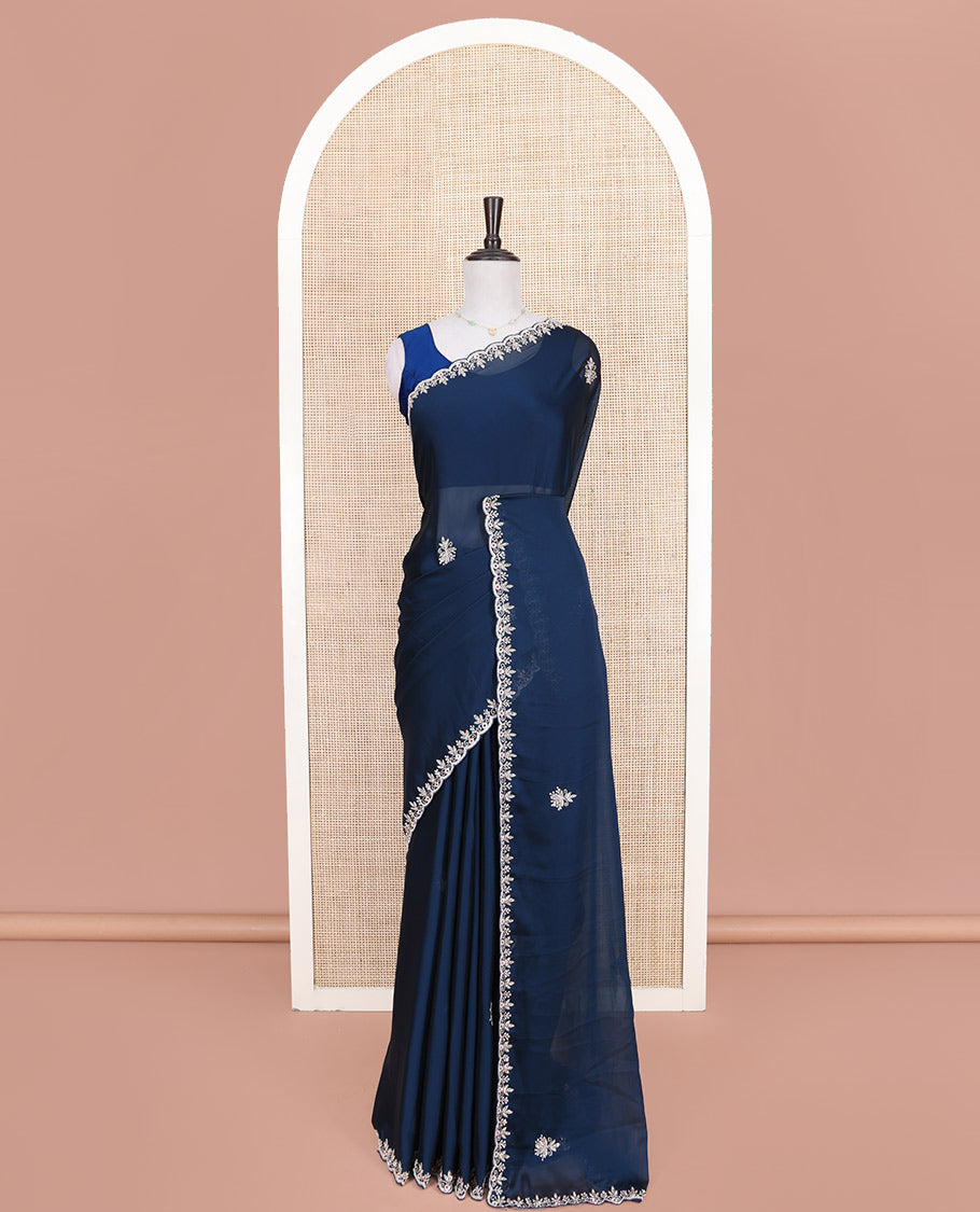 Blue Designer Saree, Mesmerized with Stone Embroidered Buttas on Its Body, Highlighted by Scallop Stone Work Border, Self-Pallu, and Paired with a Matching Embroidered Blouse