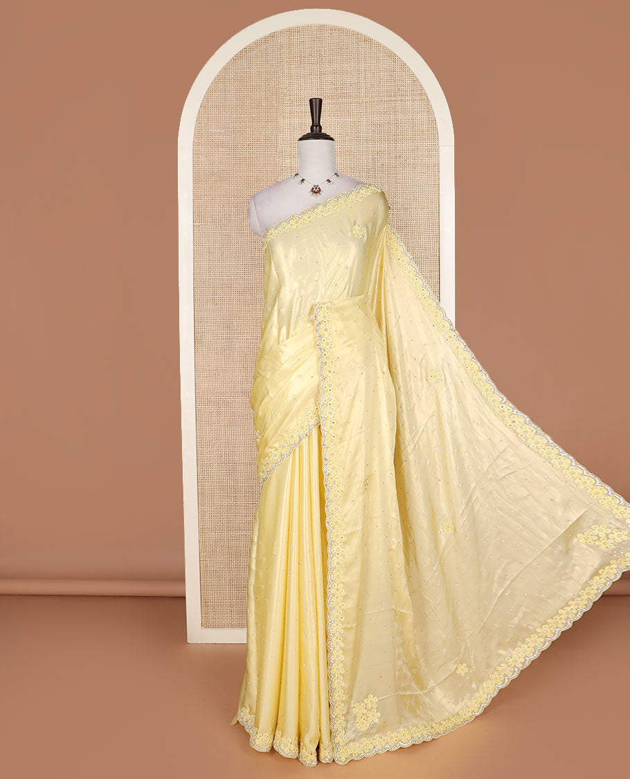 Yellow flower buttas embroidered with stone work designer saree, flower buttas embroidered with stone work scallop border