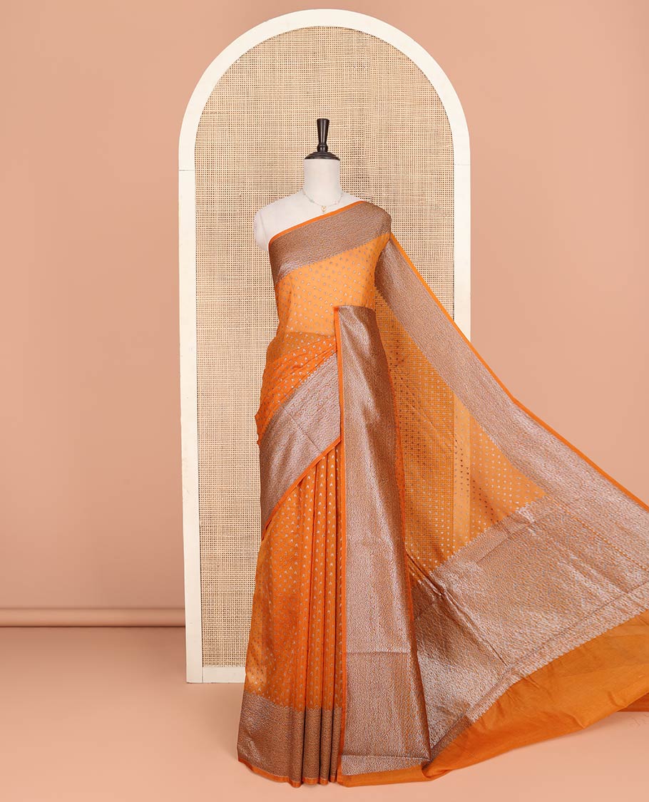Orange Fancy Georgette Saree Decked Up with Zari Buttas, Hazily Zari Woven Border of Traditional Designs, Hazily Woven Pallu of Intricate Designs, and Paired with a Matching Blouse