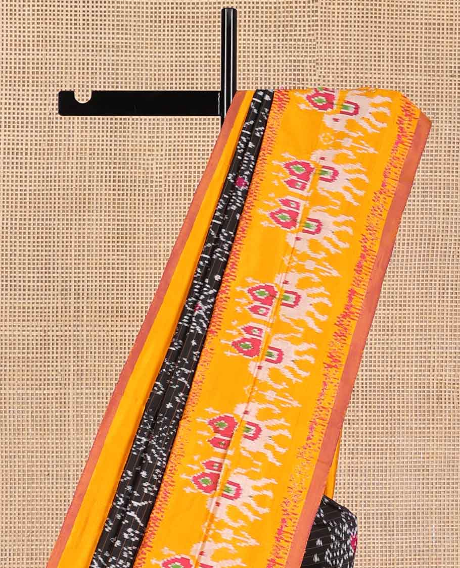 Black floral design ikkat saree with contrast animal design border & floral design pallu