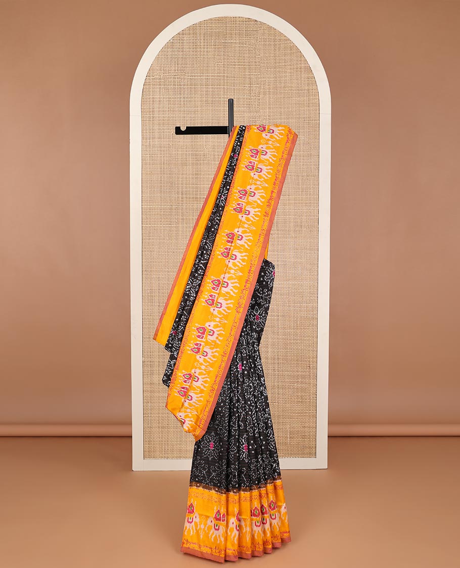 Black floral design ikkat saree with contrast animal design border & floral design pallu