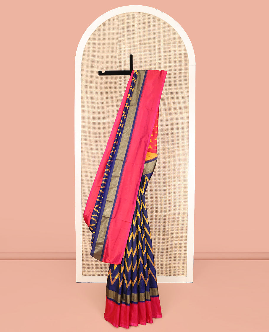 Blue Ikkat Silk Saree, Delicately Woven with Chevron Designs All Over Its Body, Complemented by a Contrast Border, Pallu Steeped with Temple Designs, and Paired with a Contrast Blouse