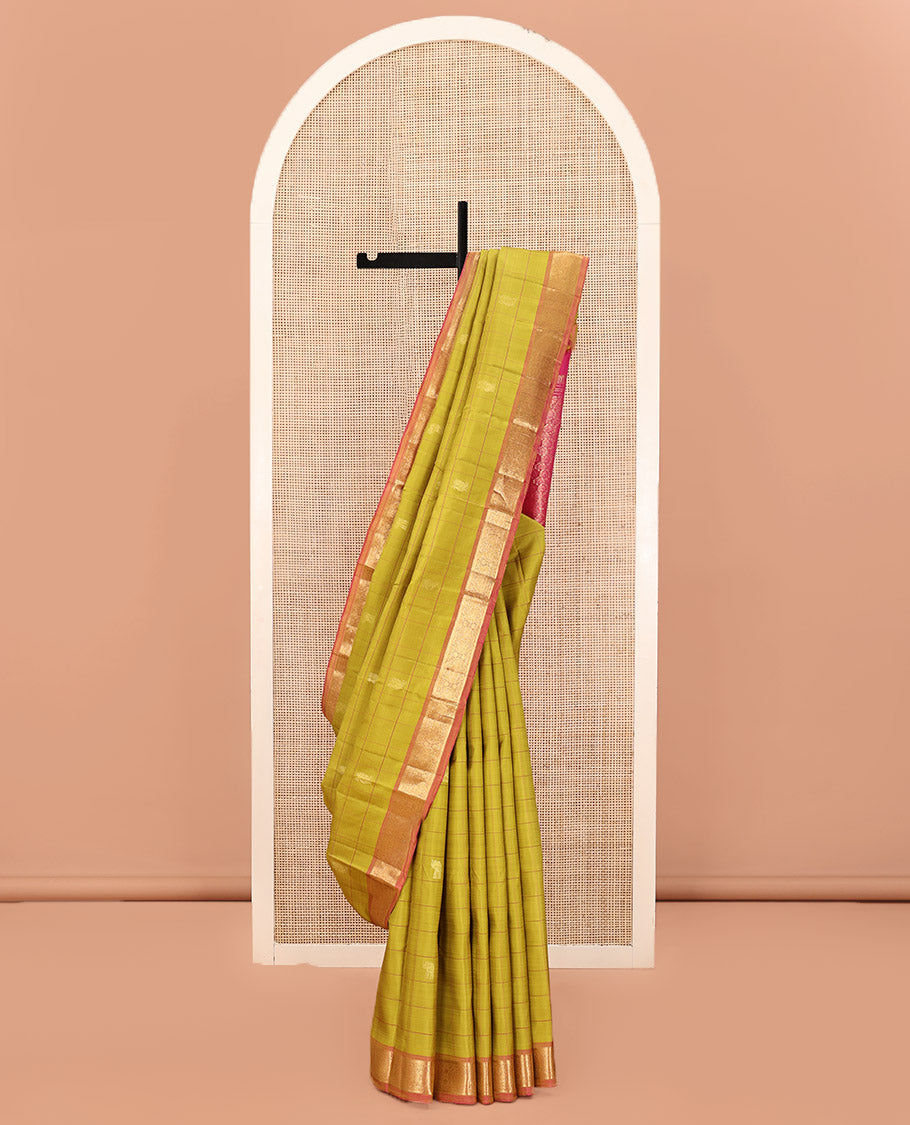 Green Kanchipuram Silk Saree, Sparsely Sparkled with Mayil Butta Enclosed Checked All Over Its Body, Complemented by a Contrast Traditional Zari Design Border, Pallu of Intricate Designs, and Paired with a Contrast Blouse