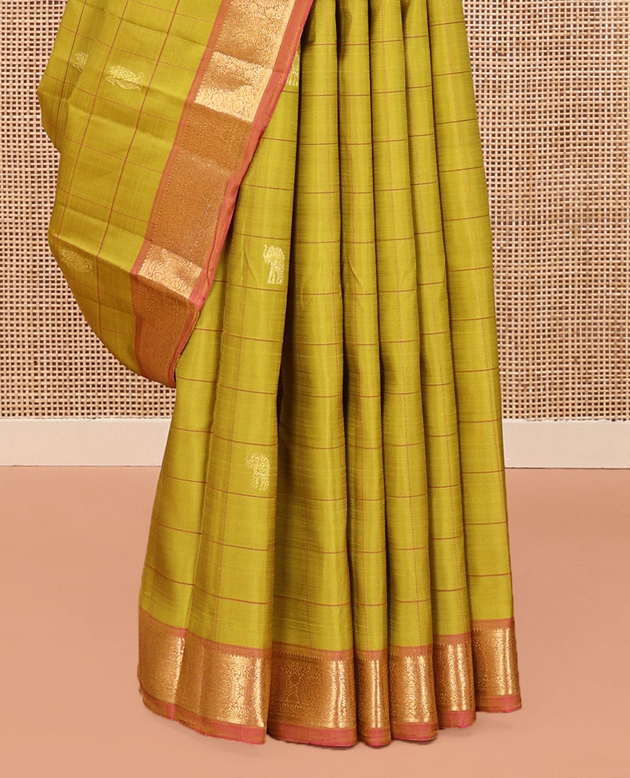 Green Kanchipuram Silk Saree, Sparsely Sparkled with Mayil Butta Enclosed Checked All Over Its Body, Complemented by a Contrast Traditional Zari Design Border, Pallu of Intricate Designs, and Paired with a Contrast Blouse