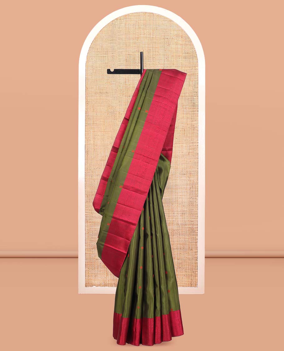 Green Kanchipuram Silk Saree, Delicately Woven with Mayil-Chakram Buttas, a Contrast Border of Thilakam, Kathir, Mayil, and Yaanai Designs, Thread-Woven Pallu, and a Contrast Blouse