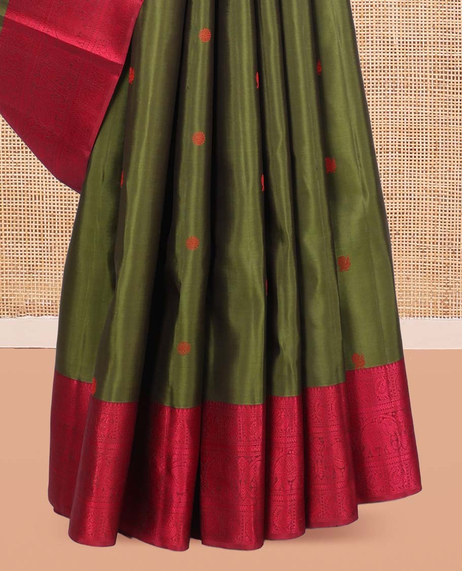 Green Kanchipuram Silk Saree, Delicately Woven with Mayil-Chakram Buttas, a Contrast Border of Thilakam, Kathir, Mayil, and Yaanai Designs, Thread-Woven Pallu, and a Contrast Blouse