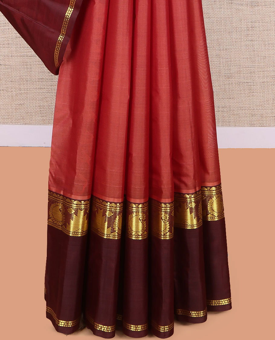 Rust Kanchipuram Silk Saree, Woven with Buttas, Complemented by a Contrast Rettai Pettu Border of Thazampoo Rekku and Arumbu Manga, Zari Design Pallu, and Contrast Blouse