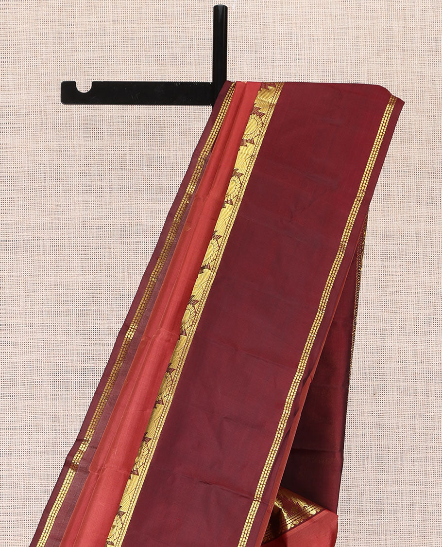 Rust Kanchipuram Silk Saree, Woven with Buttas, Complemented by a Contrast Rettai Pettu Border of Thazampoo Rekku and Arumbu Manga, Zari Design Pallu, and Contrast Blouse