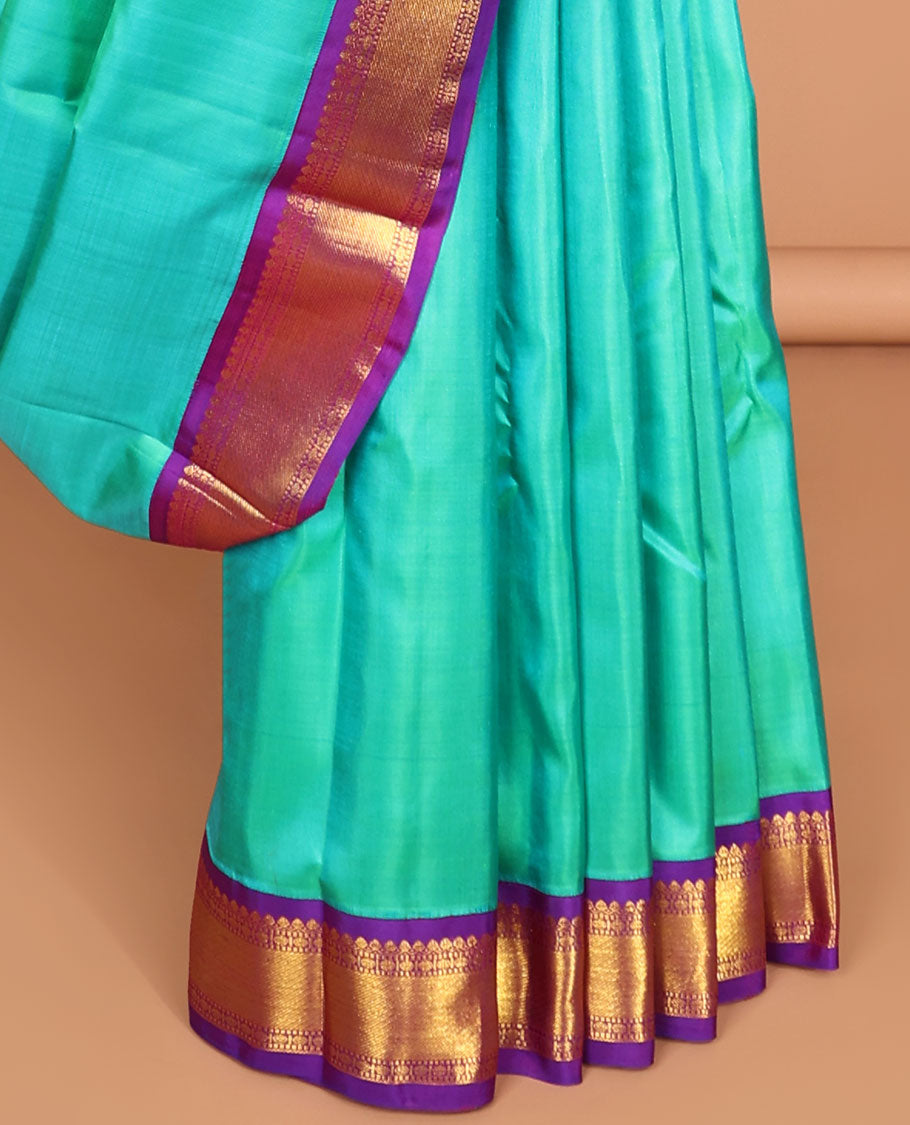 Blue kancheeuram silk saree with contrast korvai zari design border & striped pallu