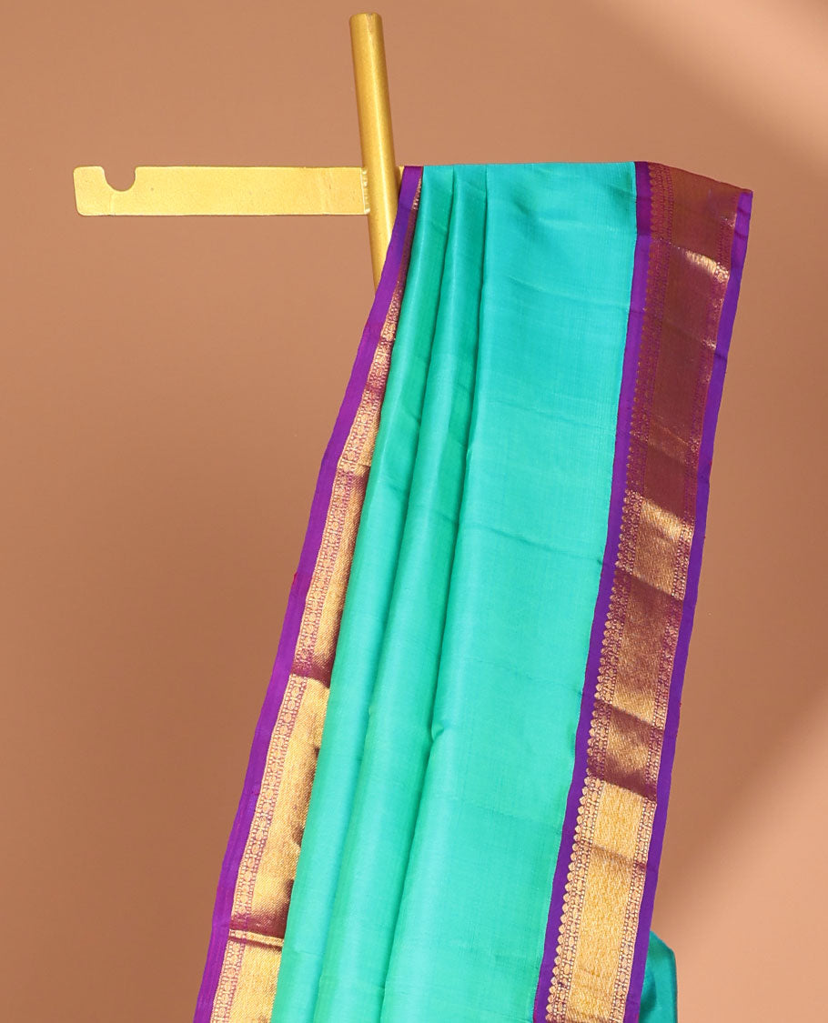 Blue kancheeuram silk saree with contrast korvai zari design border & striped pallu