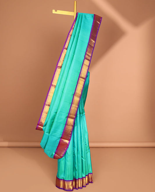 Blue kancheeuram silk saree with contrast korvai zari design border & striped pallu