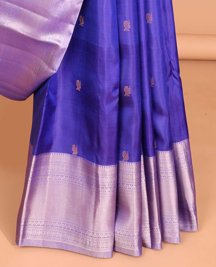 Dark blue buttas kancheepuram silk saree with contrast border of thilakam mokku, muthu, banaras, paun design & zari design pallu