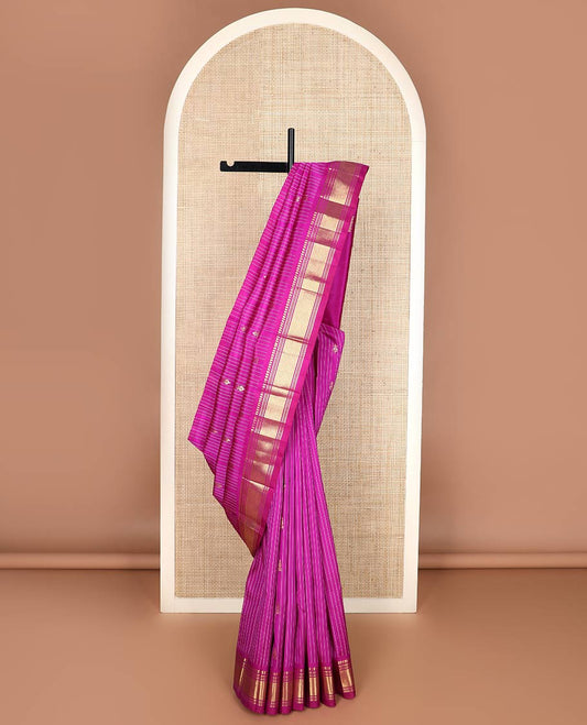 Rani pink stripes & buttas Kanchipuram silk saree, one-sided border of panner sombu,banaras & mayil kann & zari design pallu