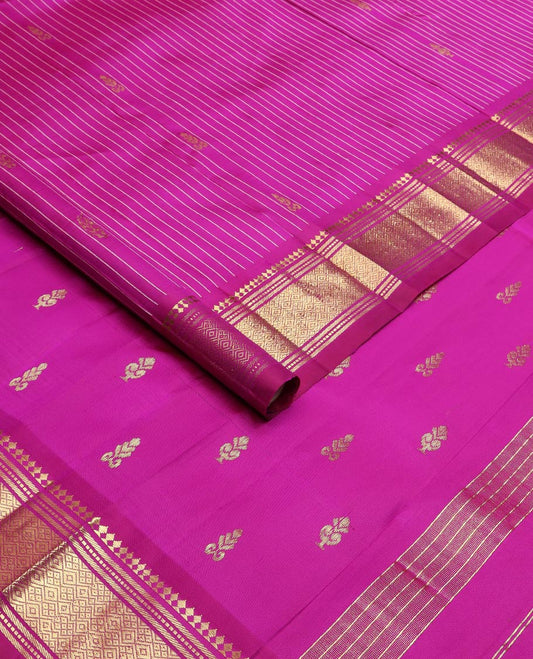 Rani pink stripes & buttas Kanchipuram silk saree, one-sided border of panner sombu,banaras & mayil kann & zari design pallu