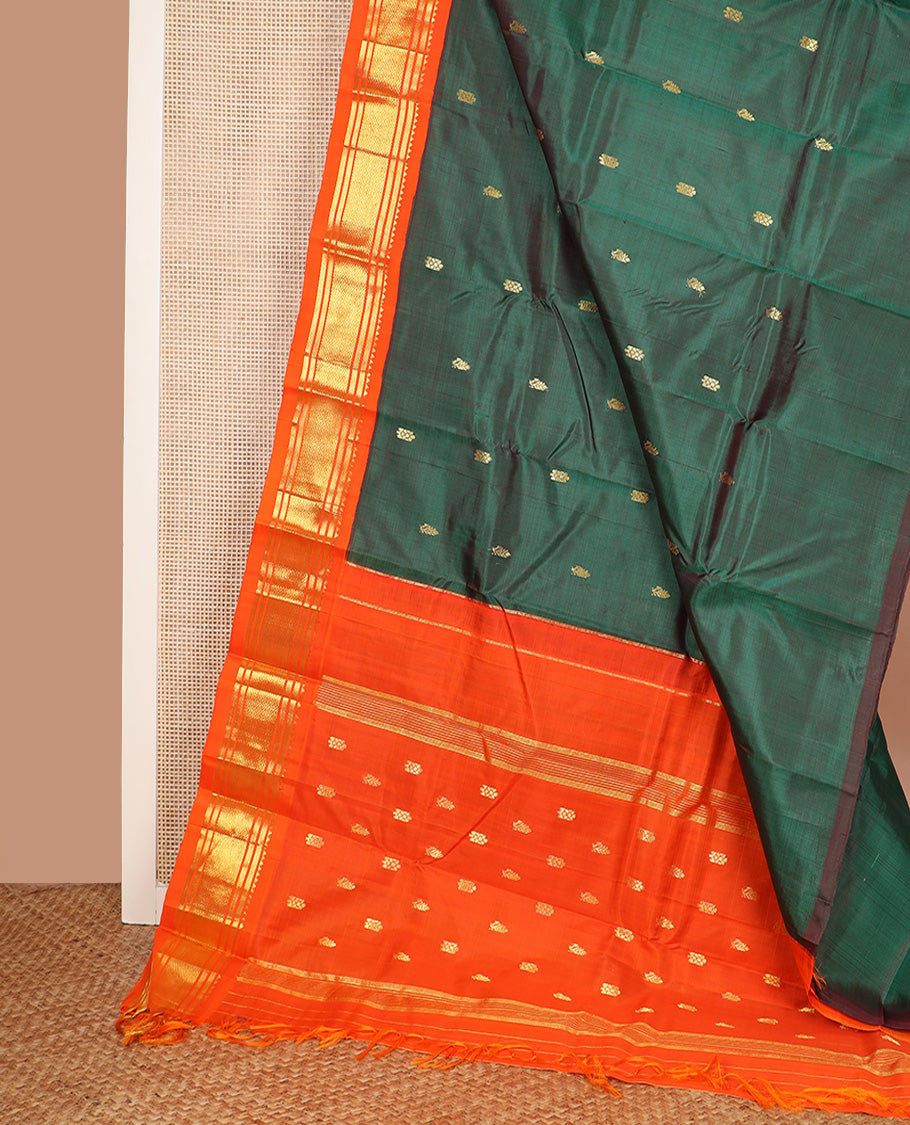 Green zari buttas Kanchipuram silk saree, contrast one-sided korvai border of rekku, banaras, and jaal design, and zari design pallu