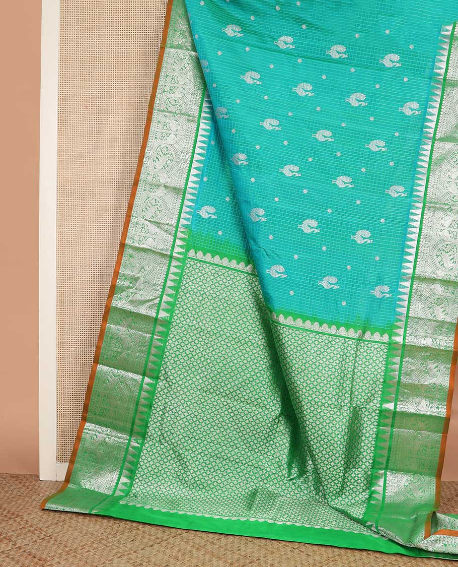 Green checked and zari buttas Kanchipuram silk saree, contrast border of rekku, salngai, muthu, chakram, kili designs, and jaal pallu