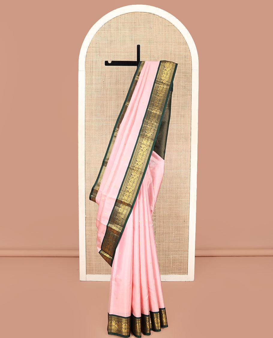 Pink Kanchipuram Silk Saree, Subtly Sparkled with Buttas on Its Body, Complemented by a Contrast Border of Thilakam, Banaras, Muthu, Neli, and Mayil Designs, Grandly Jaal Woven Pallu, and Paired with a Contrast Blouse