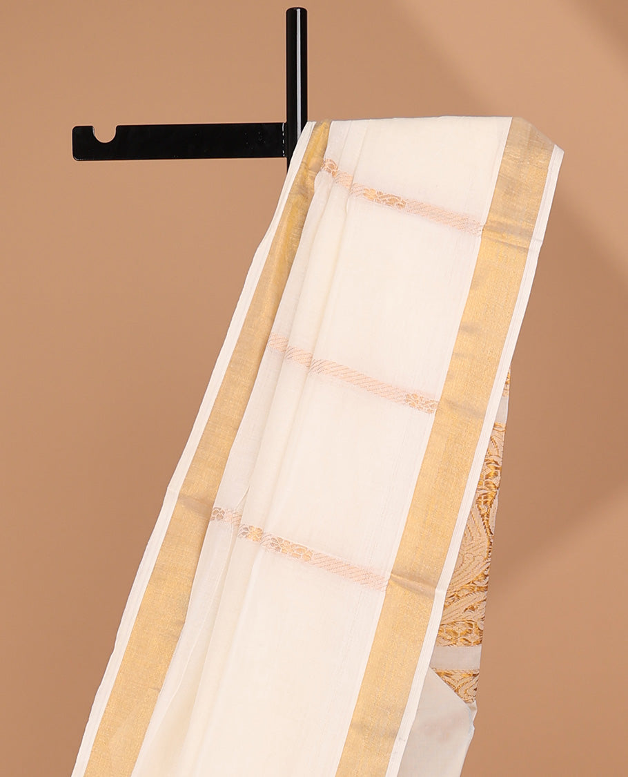Cream kerala saree with zari stripes, zari border & pallu of zari designs