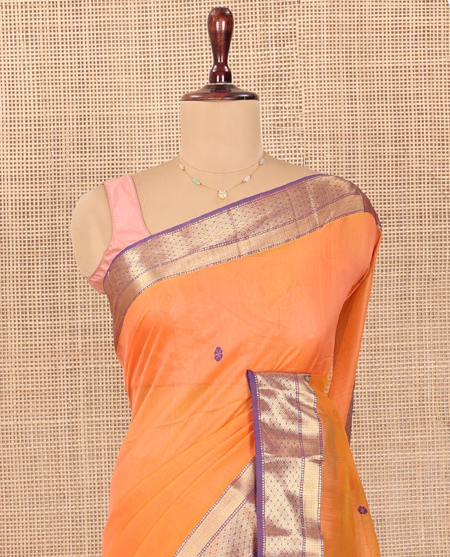 Orange Maheshwari Cotton Saree, Delicately Woven with Thread Buttas All Over Its Body, Complemented by Contrast Traditional Zari Design Border, Pallu Steeped with Zari Buttas, and Paired with a Contrast Blouse